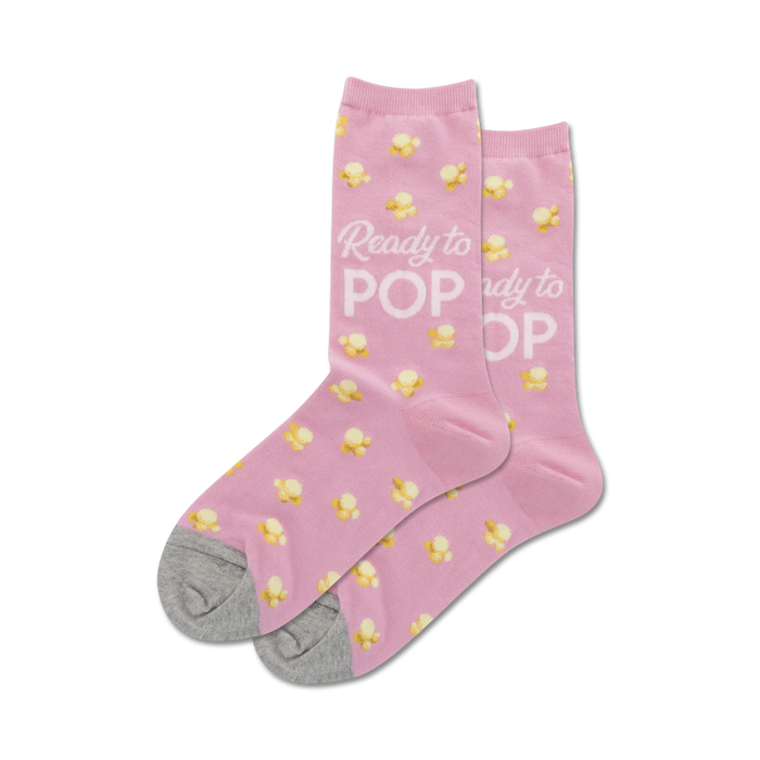 Pair of women's crew socks in pink and light blue; popcorn pattern and 'Ready to Pop' text.