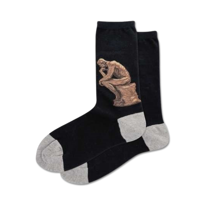 Pair of black crew socks with a detailed image of Rodin's 'The Thinker' sculpture in bronze tones on one side. Grey heel and toe. }}
