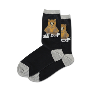 crew length women's socks, black with gray toe, heel, and top, feature a smiling brown bear with open arms and a 'free hugs' banner.   