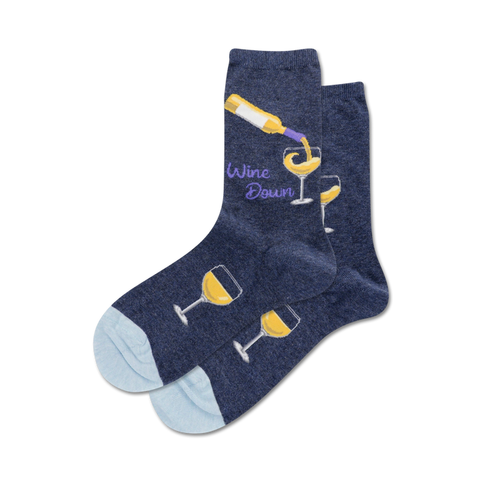 treat your feet to a toast-worthy time with wine down socks. these women's crew-length cotton socks feature a pattern of wine glasses and a wine bottle on dark blue fabric, and the text 