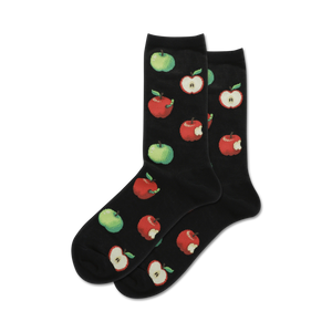 Pair of crew socks in black featuring a pattern of red and green apples, some with bites taken out.