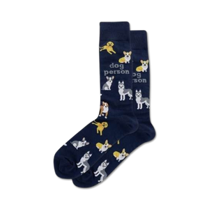 Lifestyle shot showing the navy blue 'Dog Person' socks on a person's feet.