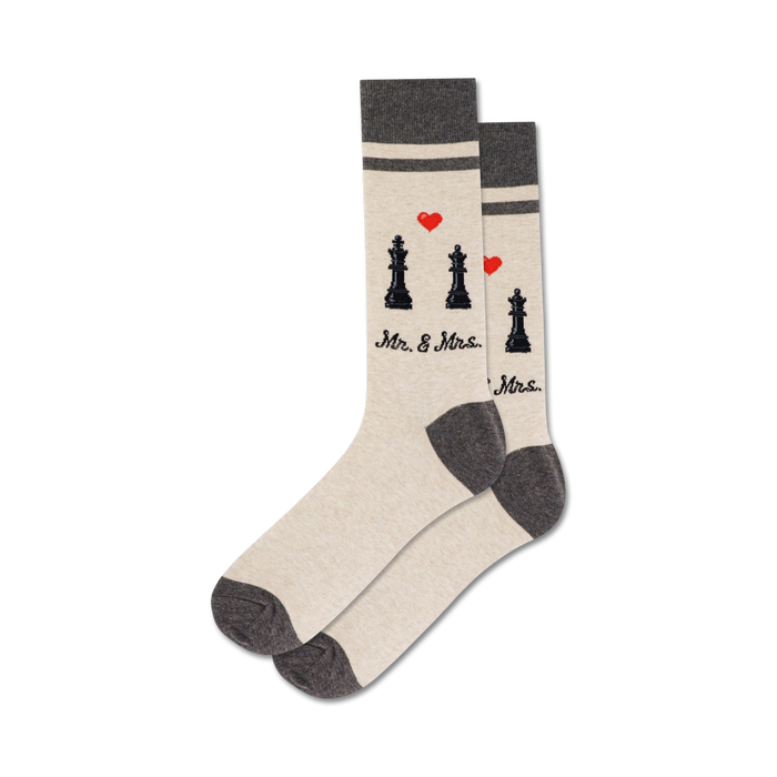 Pair of cream and grey crew socks with black chess piece and red heart design.  Text reads 'Mr. & Mrs.'