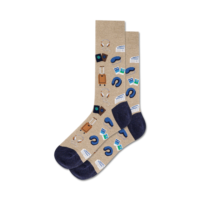 Tan crew socks with navy blue accents. Design includes illustrations of suitcases, headphones, sleep masks, and passports. }}