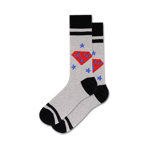 Lifestyle shot of a man wearing a pair of grey crew socks with black stripes and a red, white, and blue 'Super Dad' logo.