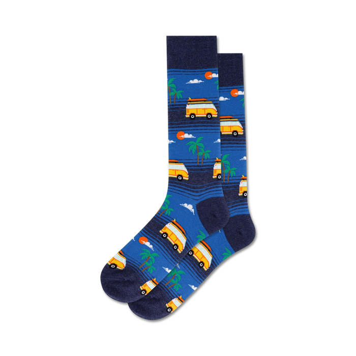 Pair of crew socks in blue and tan featuring a pattern of vintage surf vans, palm trees, and setting suns.
