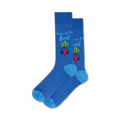 Pair of blue crew socks with a fun design. Each sock shows a beet wearing headphones and the text 'Turn up the Beet'.