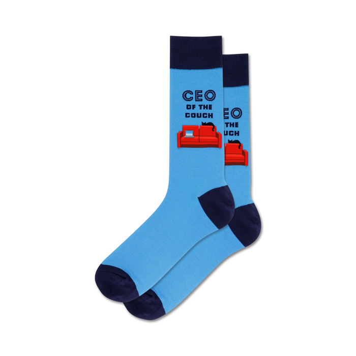 Pair of light blue crew socks with a navy blue cuff.  The socks feature a graphic of a red couch with a black cat, and the text 'CEO of the Couch'. }}