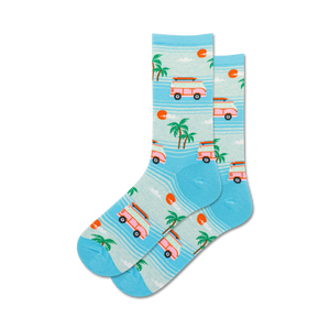 blue crew socks featuring orange and white vintage vans with surfboards driving through palm trees with a sun in the background. perfect for beach lovers.   