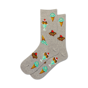 Pair of crew socks in grey and light blue, featuring ice cream and brownie illustrations. Fun and whimsical dessert-themed sock design.