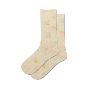 Pair of beige crew socks with a small, scattered floral pattern in pink, yellow, and mint green.