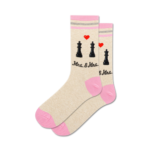 beige socks with pink toes, cuffs, and heels. mr & mrs script in black. chess pieces pattern with red hearts.  