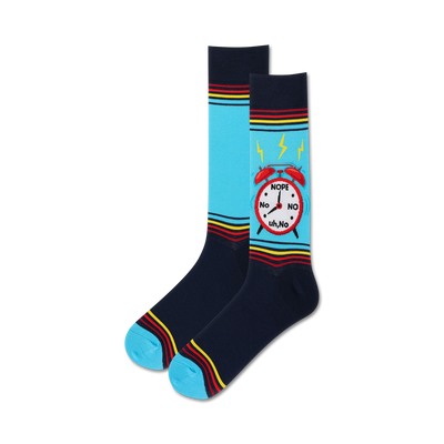 Pair of crew socks.  Navy blue with light blue sections and colorful stripes.  Features a graphic of a red alarm clock that says 'Nope' and 'No'.