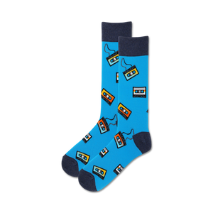 Lifestyle shot of model wearing blue Cassette Tape socks; showcases how the socks look when worn.