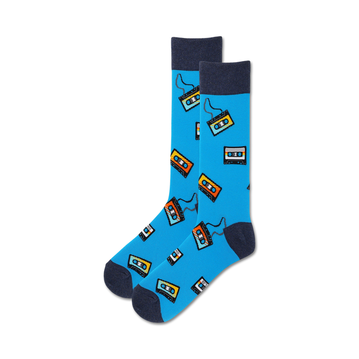 Lifestyle shot of model wearing blue Cassette Tape socks; showcases how the socks look when worn.
