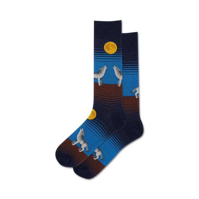 Pair of crew socks in navy, blue, and brown featuring howling wolves and a large yellow moon.  Striped design. }}