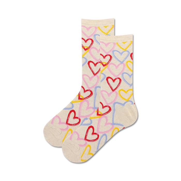 Pair of beige crew socks adorned with a playful pattern of hand-drawn hearts in pink, red, yellow, and blue. }}