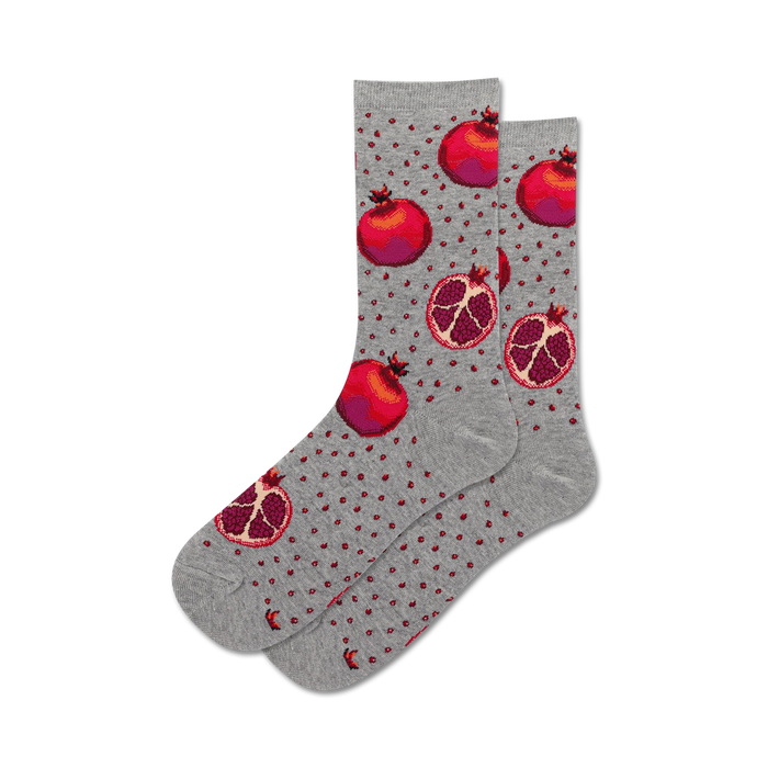 Pair of grey crew socks with a pattern of red pomegranates and small red dots. A fun and fruity design! }}