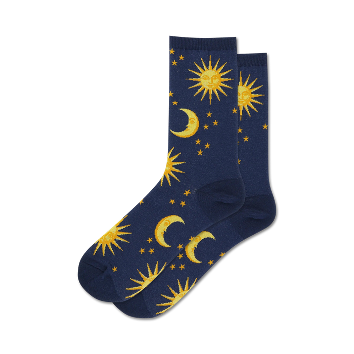 Pair of navy blue crew socks with a repeating pattern of gold suns, moons, and stars.