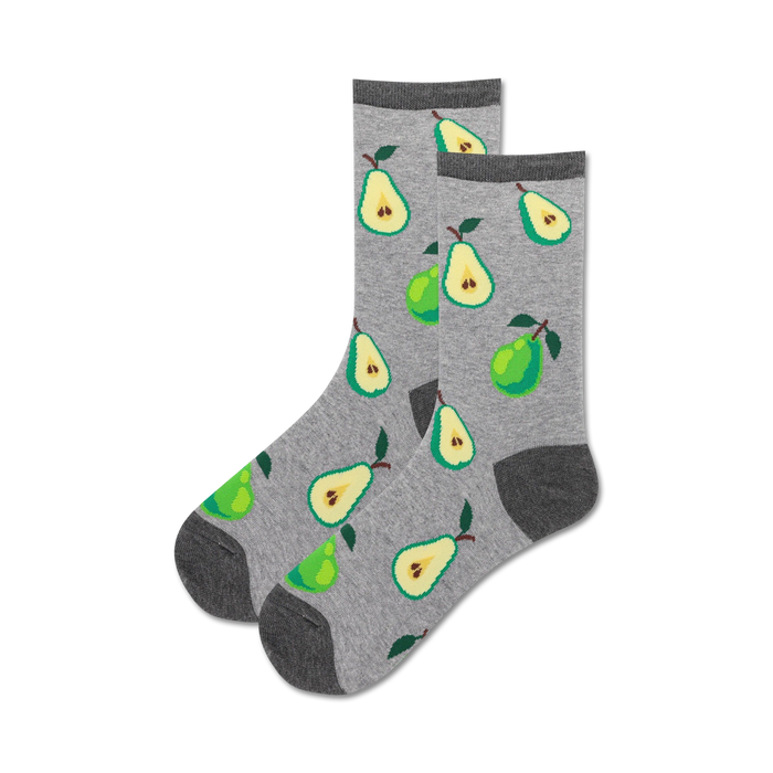 Lifestyle shot showing a person wearing the green pear socks with jeans.