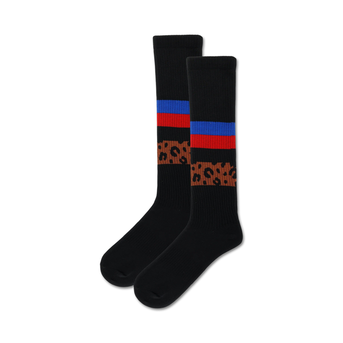 Pair of black crew socks with brown cheetah print and red, blue, and white stripes near the ankle. }}