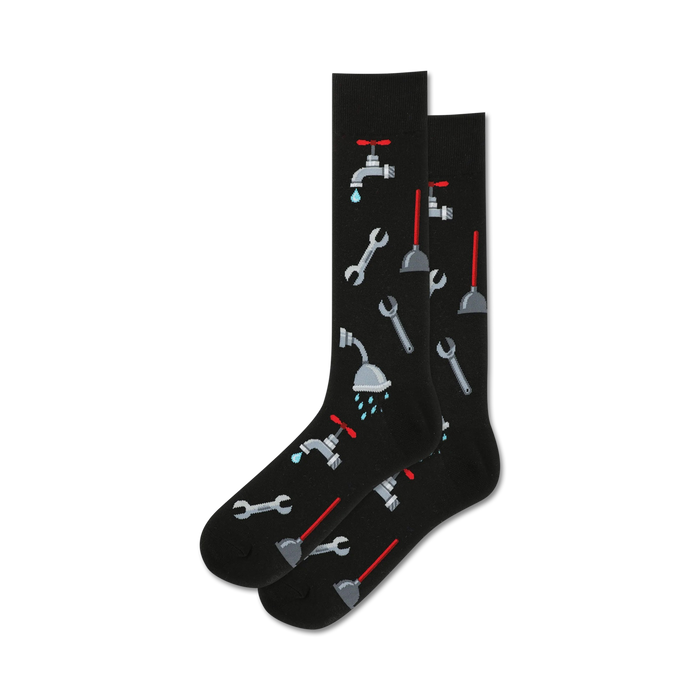 Pair of black crew socks with a fun plumbing theme. Features illustrations of wrenches, plungers, faucets, and shower heads. }}