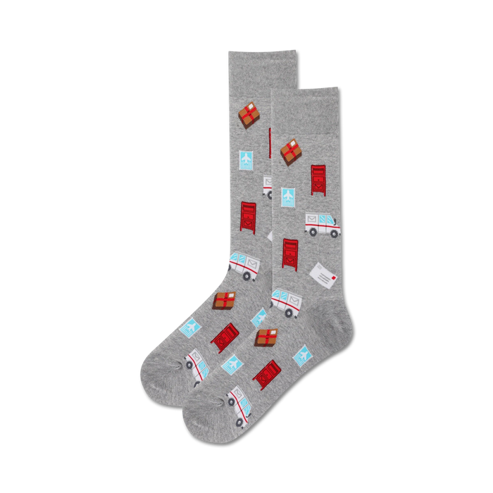 Pair of grey crew socks with a fun pattern. The design includes red postboxes, mail trucks, parcels, and envelopes. }}