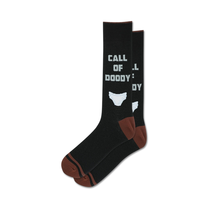 Pair of black crew socks with brown cuffs. The socks feature a 'Call of Doody' graphic and a small image of underwear. }}