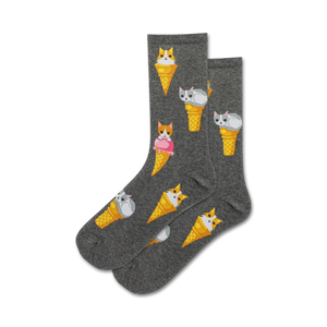 Pair of crew socks; grey, mint green; featuring a repeating pattern of cats nestled in ice cream cones.