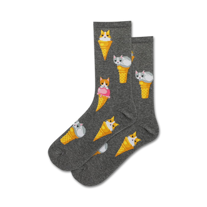 Pair of crew socks; grey, mint green; featuring a repeating pattern of cats nestled in ice cream cones.