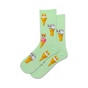 Lifestyle shot of a toddler wearing the mint green Ice Cream Cat socks.