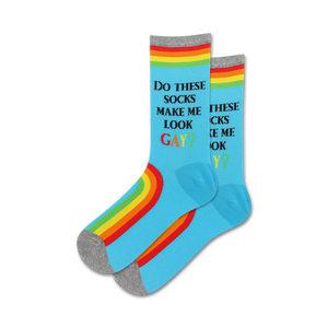 Pair of light blue crew socks with a rainbow stripe and the text 'Do These Socks Make Me Look Gay?'
