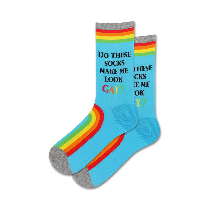 Pair of light blue crew socks with a rainbow stripe and the text 'Do These Socks Make Me Look Gay?'