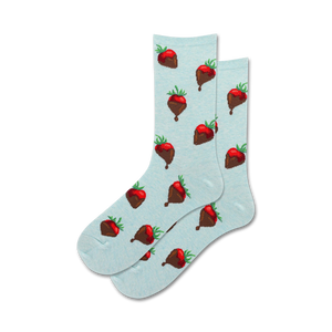Lifestyle shot showing a pair of light blue crew socks with a chocolate-covered strawberry pattern.