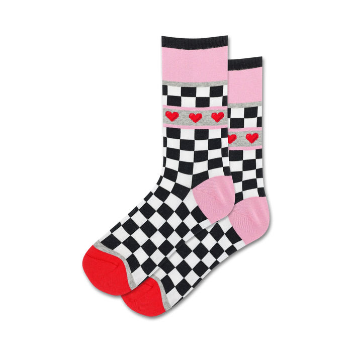 Pair of women's crew socks. Black and white checkered pattern with a pink cuff and a row of small red hearts. }}
