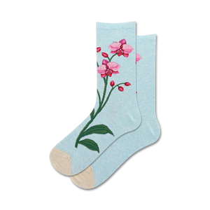 Pair of women's crew socks in light blue featuring embroidered pink orchids.  Beige heel and toe.