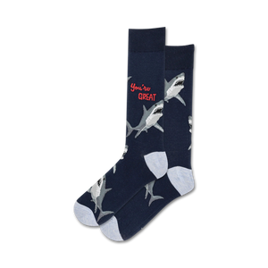Pair of crew socks; navy blue with white great white sharks and red 'You're Great' text.