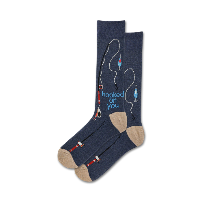 Pair of crew socks in navy blue and beige, featuring a fishing-themed design with fishing rods, hooks, and lures, and the text 'hooked on you'.