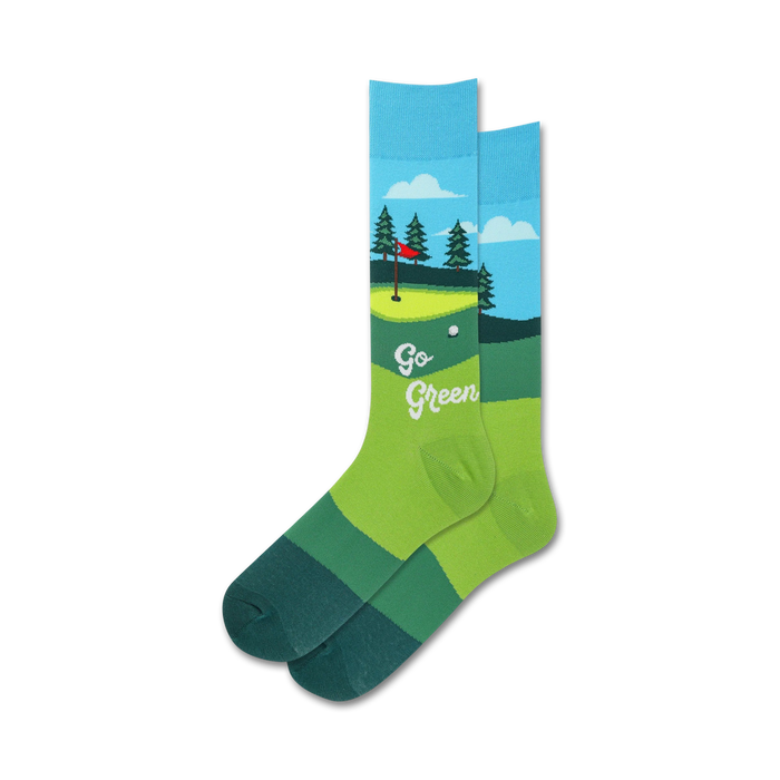Pair of crew golf socks. Light blue sky, green putting green, trees, and a flag are shown on the sock. Text reads 'Go Green'. }}