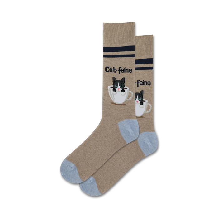 Close-up product shot of a pair of tan Cat-Feine socks with light blue cuffs.  The socks feature the same kitten-in-a-coffee-cup design, but on a beige background.