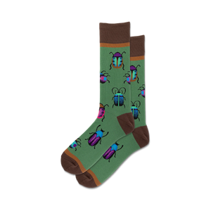 Pair of crew socks with a green background and colorful beetle designs. Brown cuff. Fun and quirky.
