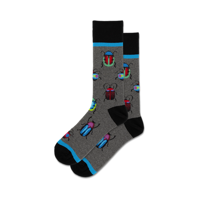 Lifestyle shot showing the gray 'Bugs' socks on a person's feet. The model appears to be wearing jeans and the setting looks casual.