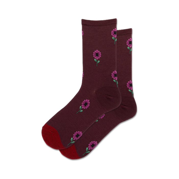 Pair of burgundy wool crew socks with a repeating pattern of small purple flowers and green stems. }}