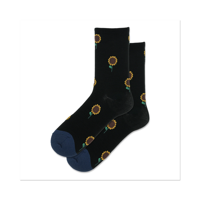 black crew socks with an allover sunflower pattern in yellow, brown, and green. blue toes and heels.   }}