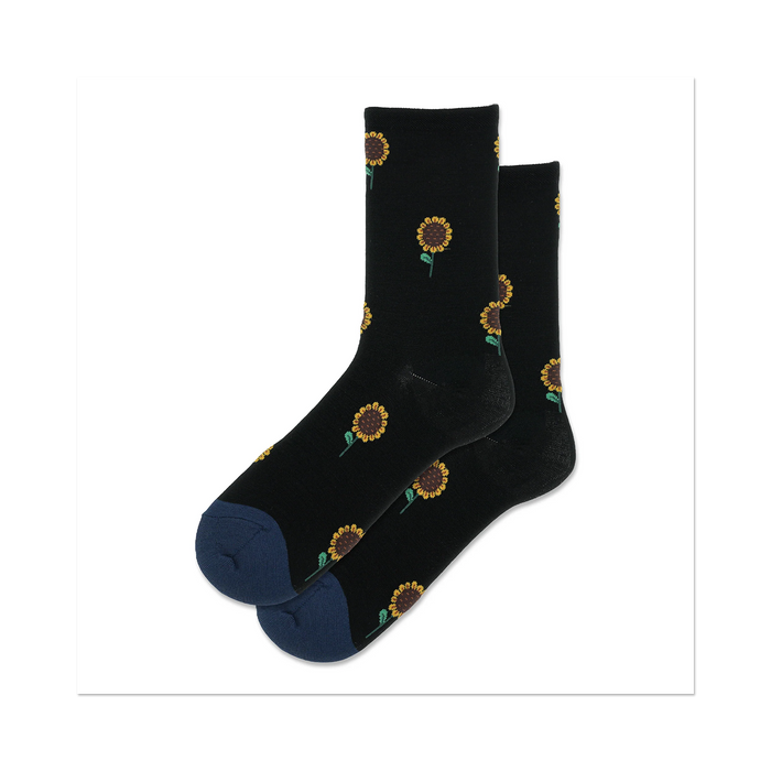 Pair of black crew socks with small sunflower designs.  Navy blue cuffs.  Cute and comfy! }}