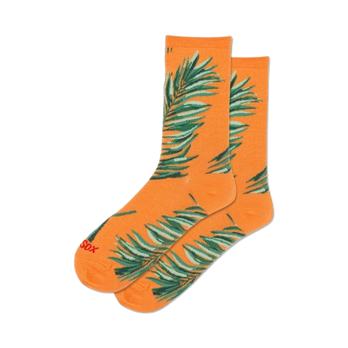 orange women's crew socks with a palm leaf pattern.  