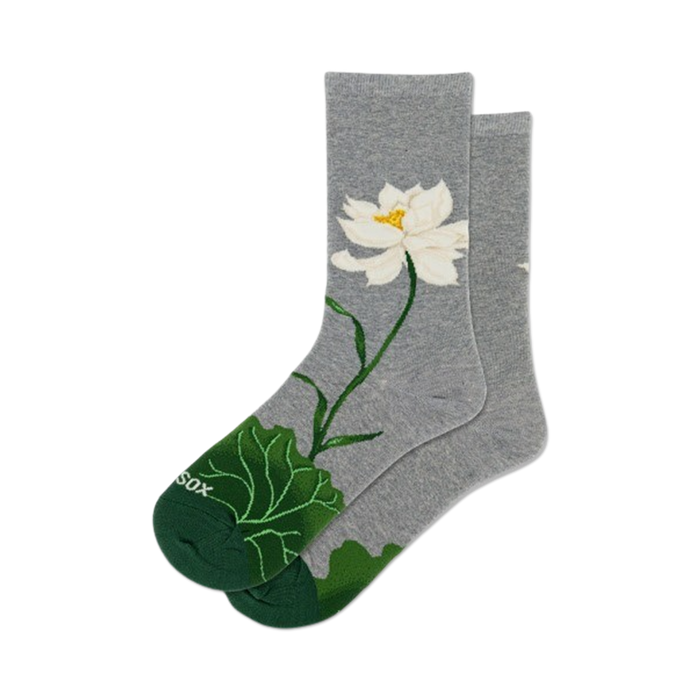 Pair of women's crew socks in grey with a detailed white lotus flower and green leaves design. }}