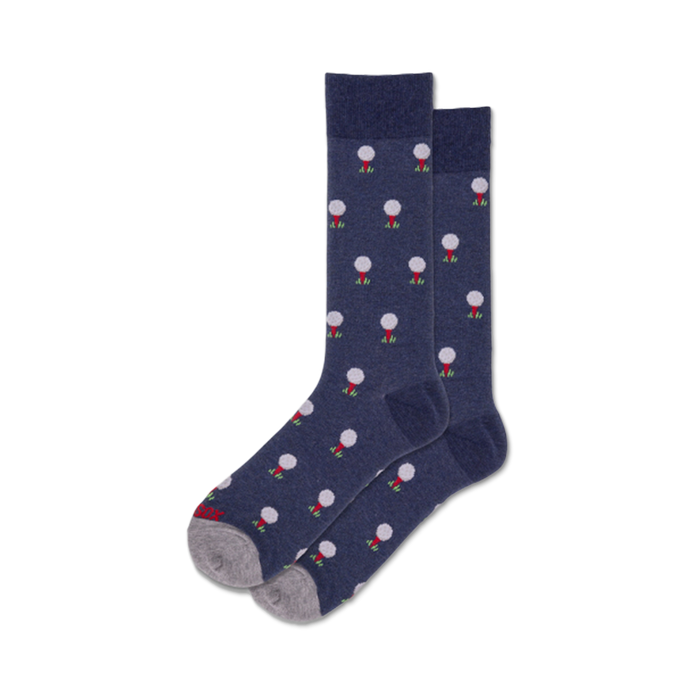 Pair of navy blue crew socks with a repeating pattern of white golf balls on red tees. }}