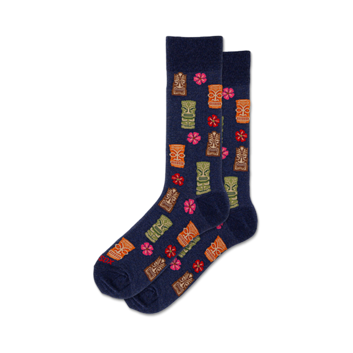 Pair of navy blue crew socks with a fun pattern of colorful tiki gods and pink hibiscus flowers. }}