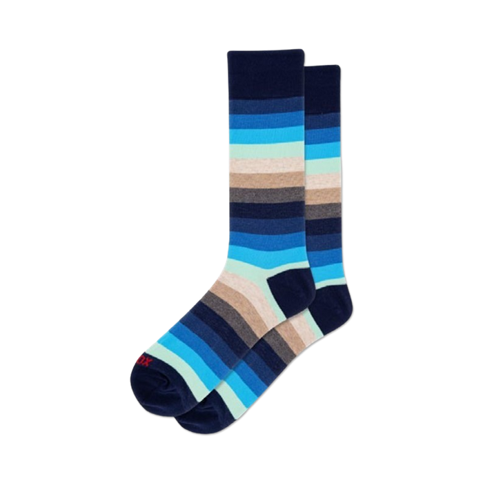 Pair of blue ombre stripe crew socks. Features horizontal stripes in shades of navy, light blue, and beige.